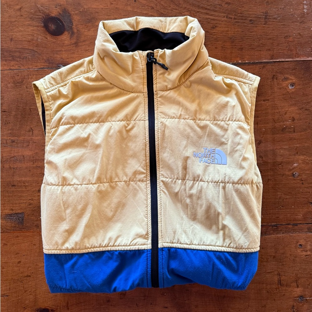 The North Face - Mens uninsulated vest, size Medium. Blue/yellow, SHARP!